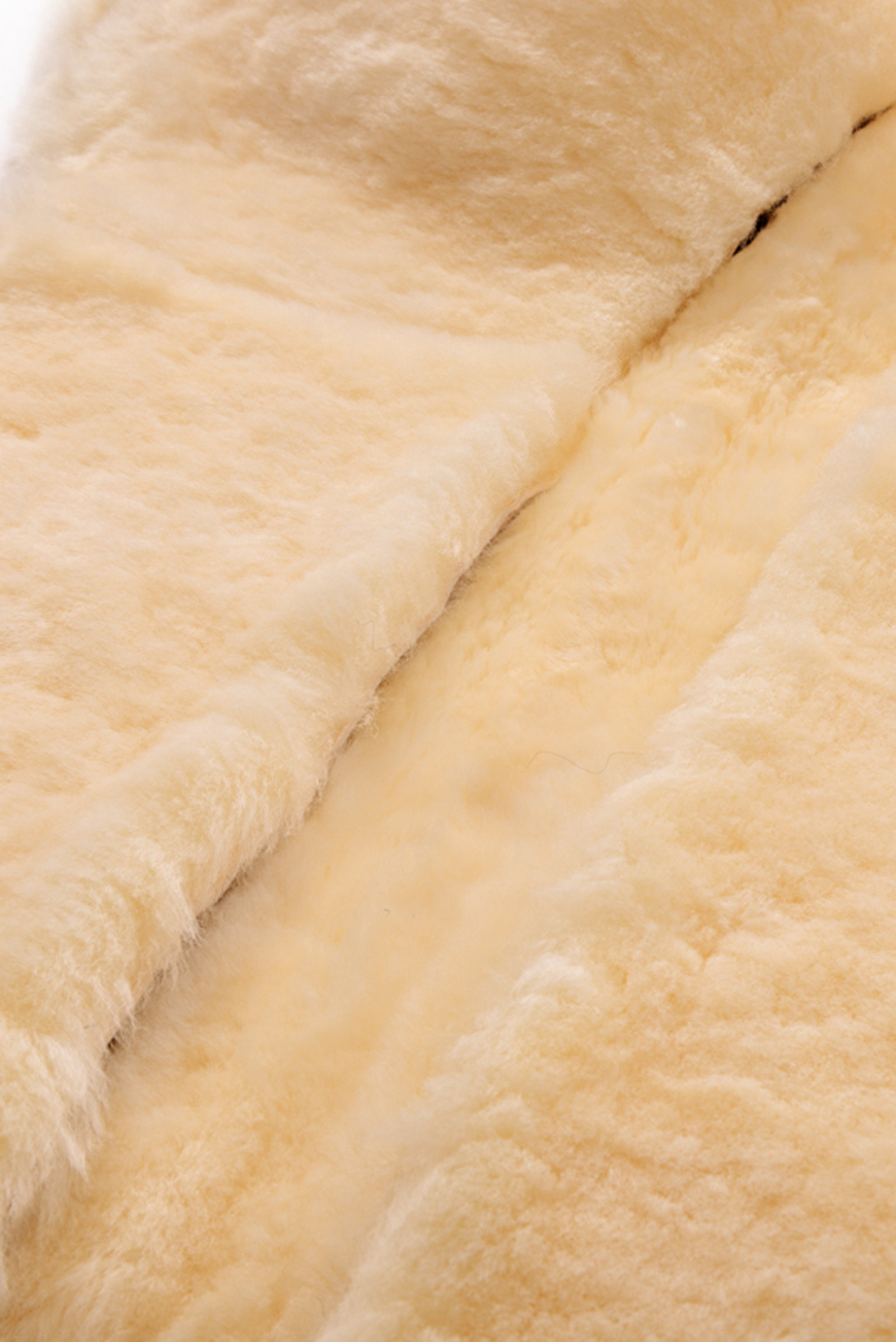 Kavalkade Almohadilla de Lana de Oveja con Bolsillos Interiores